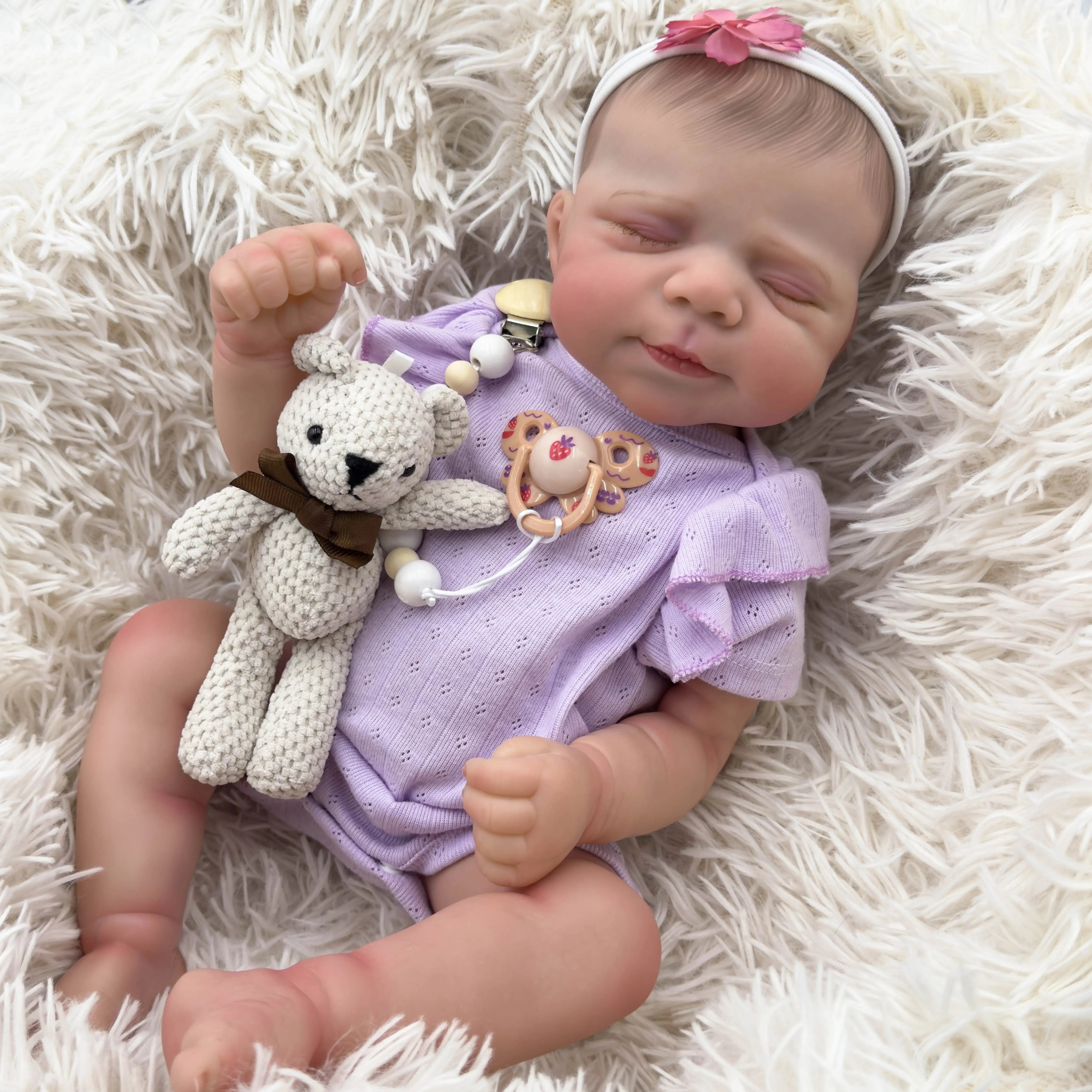 19 inch Reborn Baby doll - realistic baby girl with soft vinyl skin, purple costume and plush toys